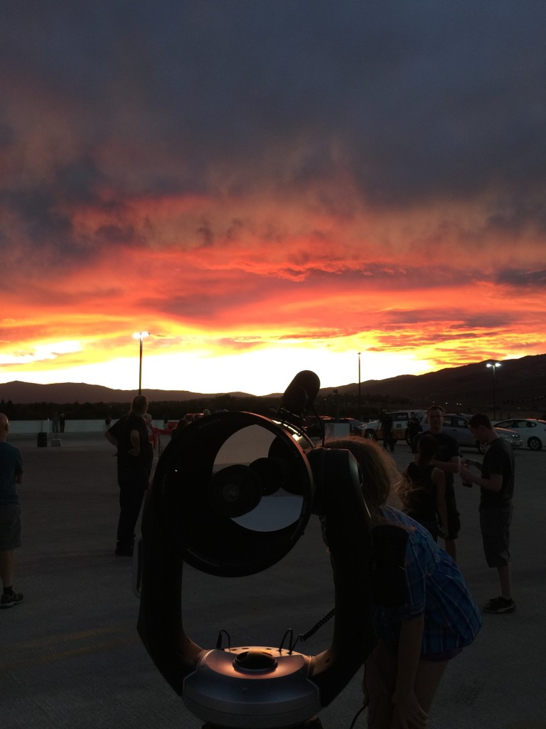 Note the mirrored surface in the back of the telescope looking into a blank sky while the real show is behind it.